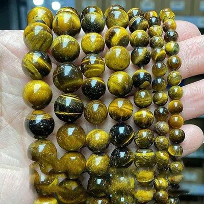 Produktbild von Tigerauge-Perlen aus Naturstein – 10 mm, ca. 37 Stück