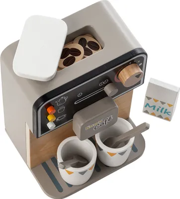 A toy coffee machine with accessories on a white background.