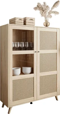A light wood vitrine with cane detailing and glass doors, displaying glassware and bowls.