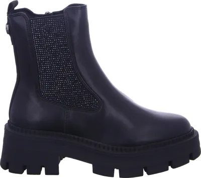 A studio shot of a single black boot.