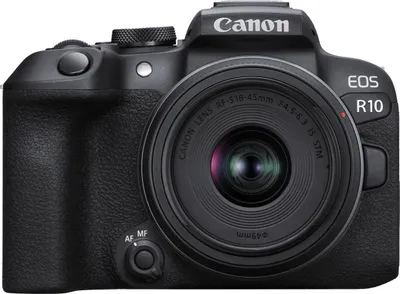 A front view of a black Canon EOS R10 camera with a lens attached, isolated on a white background.