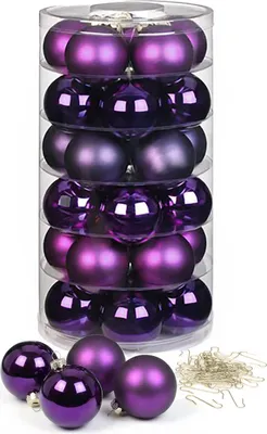 A clear product shot of purple Christmas ornaments in a clear plastic container, with some ornaments and hooks scattered in the foreground.
