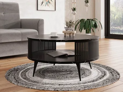 A modern living room scene featuring a black coffee table with a marble-like finish, a grey sofa, and a round rug.