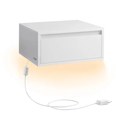 A white floating nightstand with a drawer and integrated LED lighting.