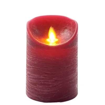 A red LED candle with a flickering flame.