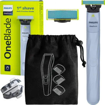 A product shot of a Philips OneBlade shaver kit, including the shaver, accessories, and packaging.