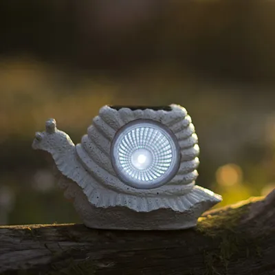 Immagine prodotto di Best Season LED-Solarstein "Schnecke" 1 LED bianco caldo, ca.9x17 cm,mit Solarpanel, incl. Akku, outdoor, 477-27