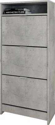 A tall, narrow shoe cabinet with a concrete-like finish and three flip-down drawers. There are two books on the top shelf.