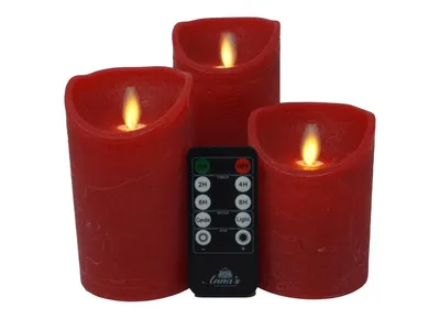 Three red LED candles with a remote control.
