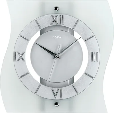 A close-up studio shot of a modern wall clock.