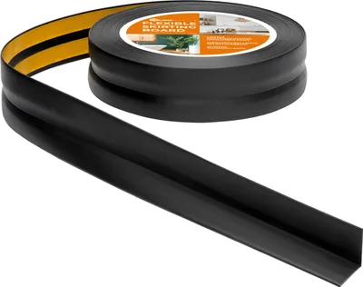A roll of black flexible skirting board with adhesive backing is shown, with a section unrolled in the foreground.