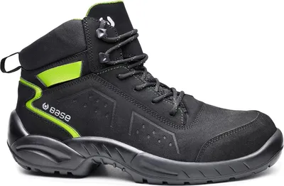 A black work boot with green accents on a white background.