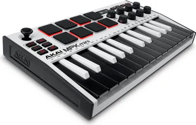 A white Akai MPK mini MKIII MIDI controller is shown from a diagonal angle against a white background.