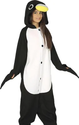 A young girl wearing a penguin costume.