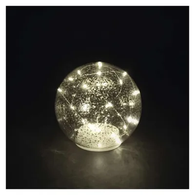 Produktbild von EMOS LED Glaskugel mit Lichterkette, 20 LEDs, Warmweiß, ⌀15 cm, 6/18h Timer, batteriebetrieben 3x AA, 10000h, für Innen, Silbereffekt, DCLW35