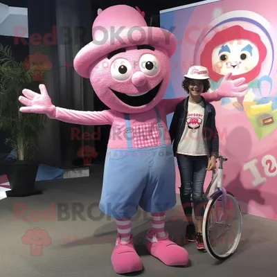 Productafbeelding van Roze eenwieler mascotte REDBROKOLY kostuum karakter gekleed met een Mom Jeans en hoeden