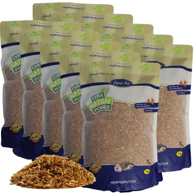 Multiple bags of pet food are stacked and arranged diagonally, with a pile of the food product in the foreground.
