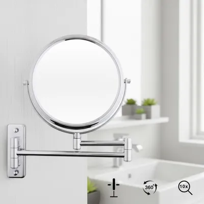 A wall-mounted makeup mirror in a bathroom setting.