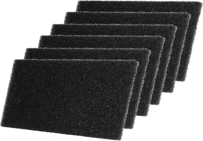 A stack of black foam filters arranged diagonally on a white background.