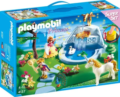 A Playmobil Princess SuperSet toy box featuring a fairy tale castle park scene with figures, a unicorn, and a swan.