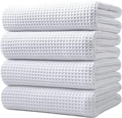 Produktbild von Unyqoos® Mikrofaser-Badetuch 4er-Set – Oversized 152 x 76 cm, schnelltrocknend & fusselfrei, Waffelgewebe weiß, Satinrand, Gewicht >429 g/m², ideal für Reise & Pool
