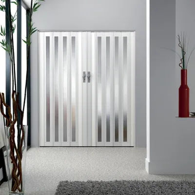 A folding door with glass panels in a modern interior setting.