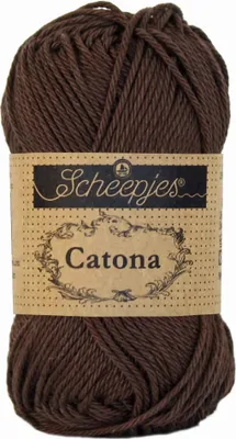 A ball of brown yarn with a label.