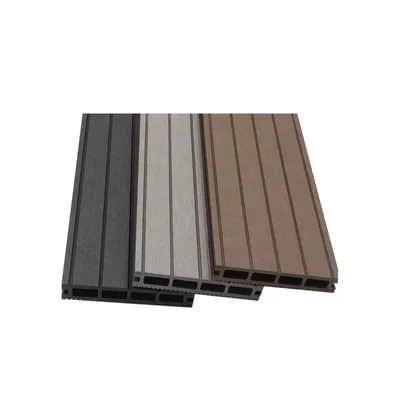 Three composite decking boards in different colors are shown side-by-side.