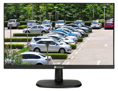 A monitor displaying a parking lot scene with many cars.