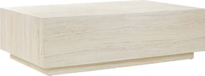 A rectangular coffee table with a travertine-like finish.