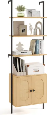 A tall, narrow bookshelf with a cabinet at the bottom, filled with decorative items and books.