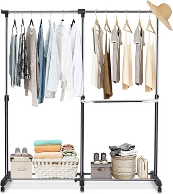 A double-bar garment rack displaying various clothing items and accessories on a white background.