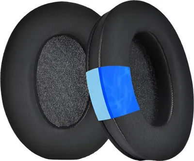 Two black headphone ear pads are shown, with a cutaway revealing layers of blue and light blue material.