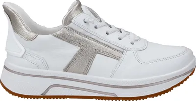 A side view of a white and silver sneaker.