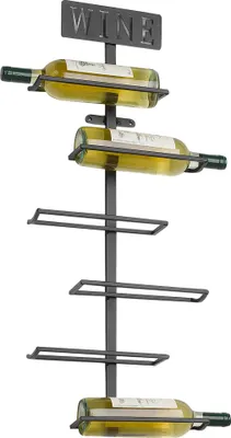A black metal wine rack with bottles of white wine.