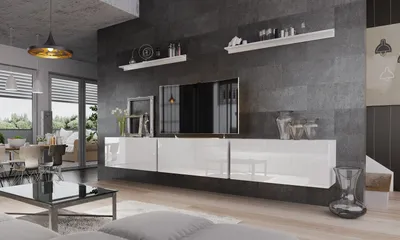 A modern living room with a TV unit, sofa, and dining area.