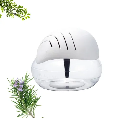 A white air purifier with a clear water reservoir sits on a white background, next to a sprig of rosemary and some green leaves.