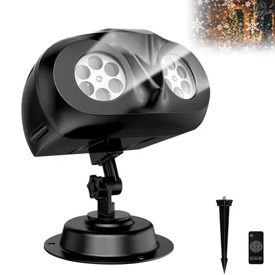 A black Christmas projector light with a stand and a ground stake accessory, shown against a white background.