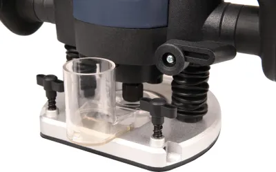 A close-up view of the base of a router, showing some of its components.