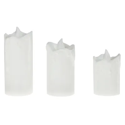 Three white LED candles of varying sizes are arranged in a line against a white background.