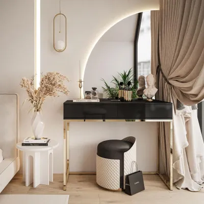 A modern vanity table with a large illuminated mirror, a stool, and decorative items in a bedroom setting.