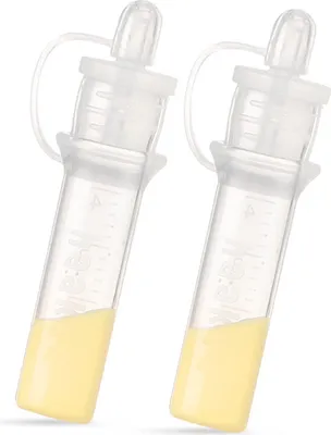 Two clear plastic containers with yellow liquid inside, against a white background.