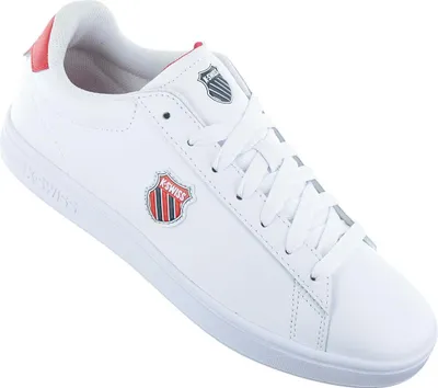 A single white K-Swiss sneaker with red accents is shown against a white background.