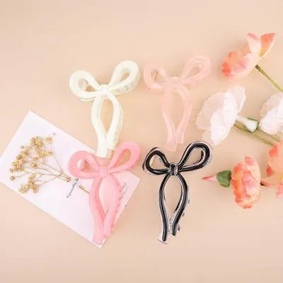 Immagine prodotto di Fermagli per capelli a forma di farfalla, 4 pezzi, eleganti fermagli per ragazze e donne