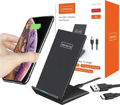 A hand is placing a smartphone on a black wireless charger, with the product packaging in the background.