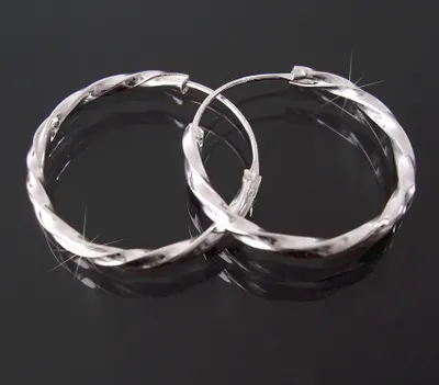 Produktbild von Ohrringe Silber 925 Creolen 25mm Niklarson gedreht 20320-25