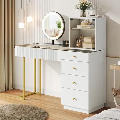 A white vanity table with a lighted mirror and drawers, set against a lightly striped wall.