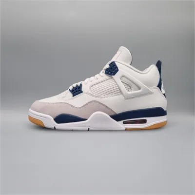 A side view of a Nike Air Jordan 4 Retro SB "Navy" sneaker against a plain gray background.