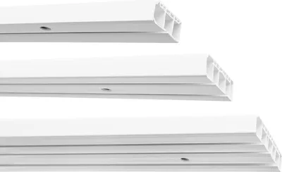 Three white plastic curtain rods of varying lengths are stacked on a white background.