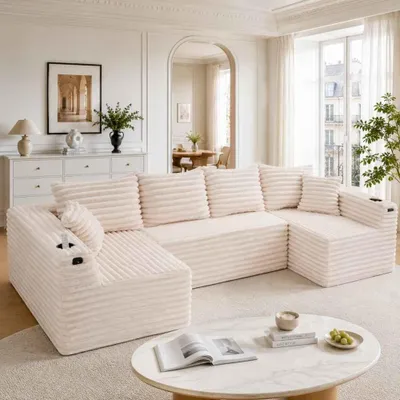 Immagine prodotto di Divano a L in velluto AIORBER a 6 posti con portabicchieri, tasche laterali, imbottitura a molle e cuscini, beige